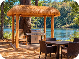 Guests enjoying waterfront amenities at Roses RV River Resort on the Alabama River