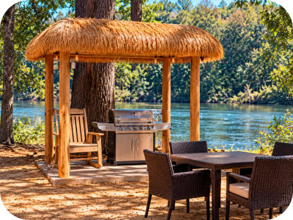 Guests enjoying waterfront amenities at Roses RV River Resort on the Alabama River