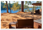 A view of the barbecue grill and tiki hut at Roses RV Resort.